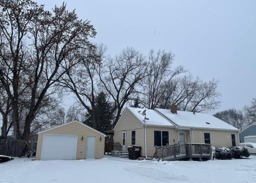 Front of home has great curb appeal with oversized one car garage. Garage has a garage door on back of garage as well. Updated siding and windows approximately 10 years ago.