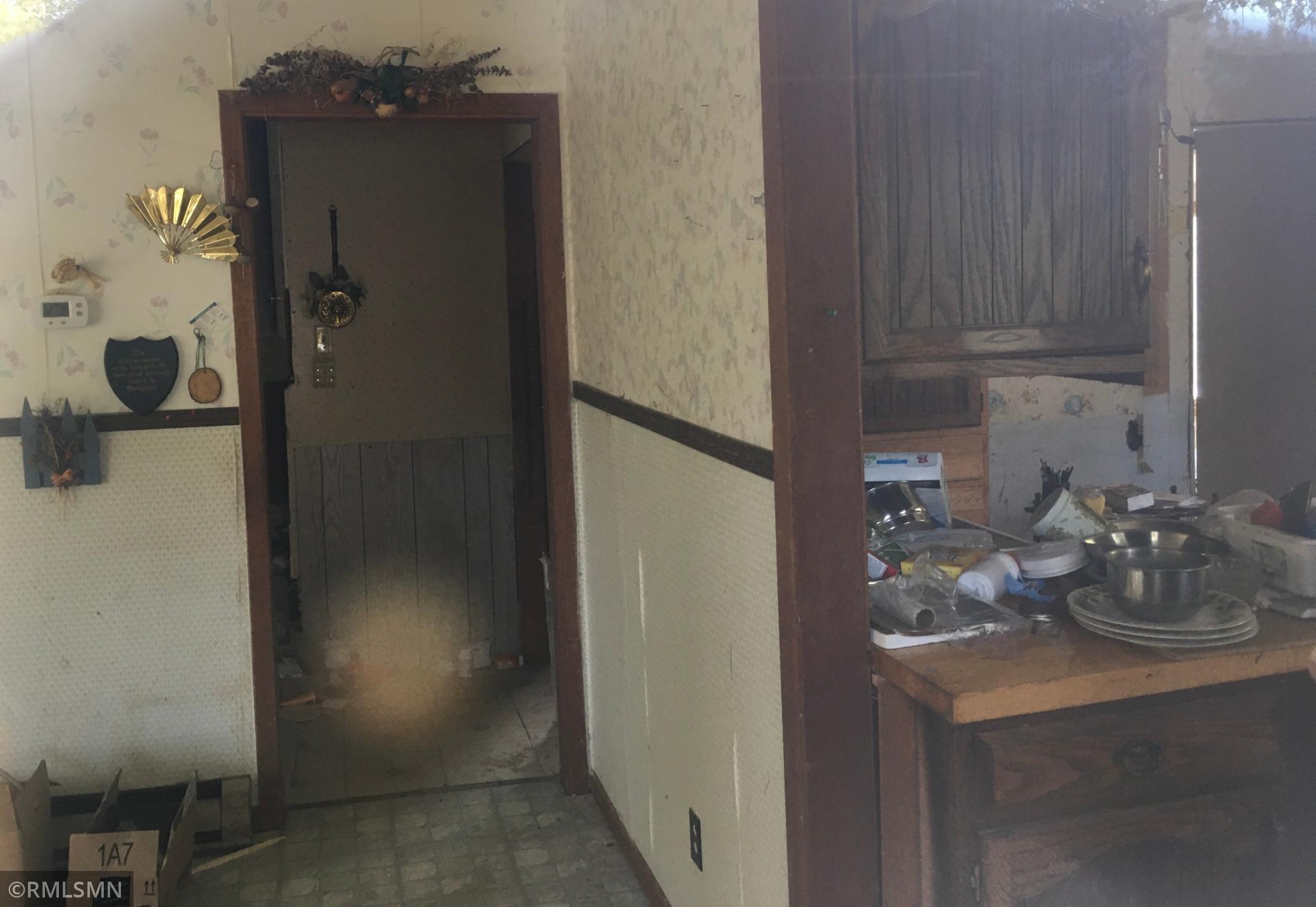 Doorways to kitchen. bathroom, bedroom in house