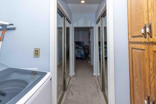 View from main floor laundry into 2nd bedroom