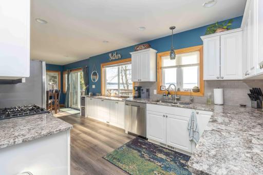 Updated kitchen with quartz counter tops and backsplash
