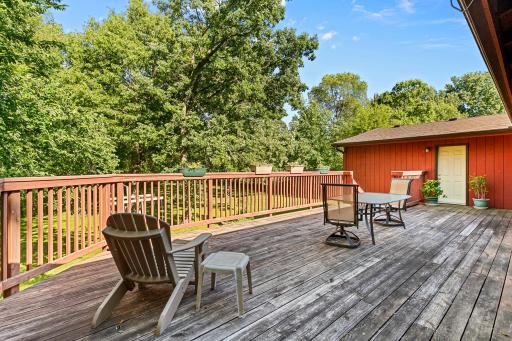 The deck overlooks the beautiful backyard. Sit out here and watch the wildlife!