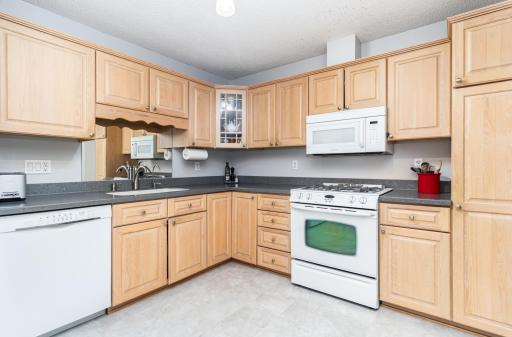 A light and bright kitchen with natural woodwork and plenty of counterspace for the chef(ess) in the home!