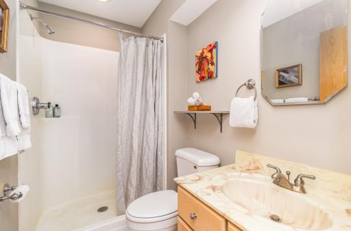 Lower level 3/4 bath next to the third bedroom would serve visiting guests well!