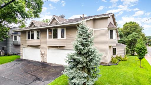 Easily accessed two-stall tuckunder garage with an abundance of storage space.