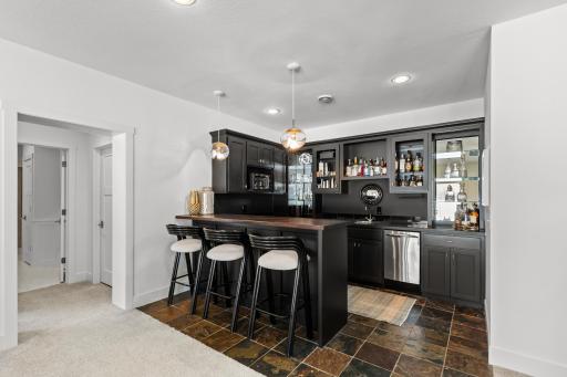Lower level wet bar - enameled cabinetry and Scotsman ice machine.