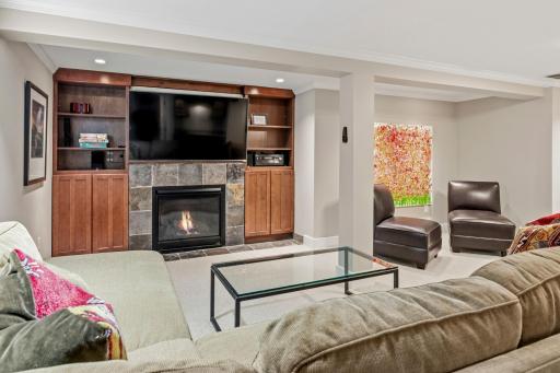 The expansive lower level provides an abundance of additional living space, offering a family room, walk up bar, home office, fitness space, two bedrooms and Â¾ bath.