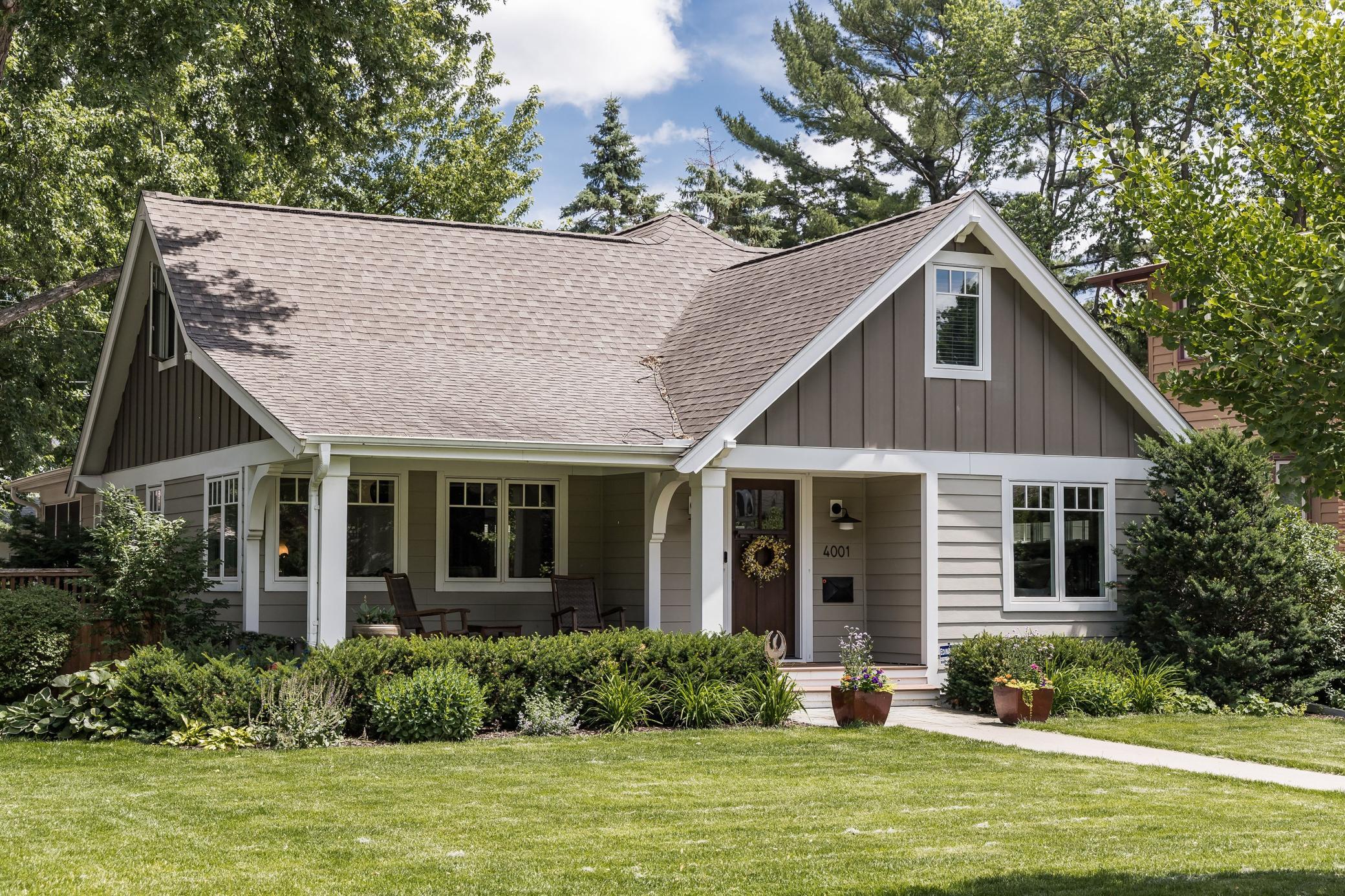 Discover timeless charm and sophisticated living in this beautifully crafted high-end cottage, located in the heart of Linden Hills.