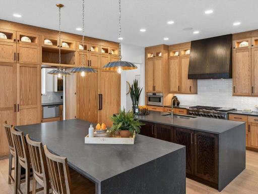 Gourmet kitchen featuring dual center islands and high-end finishes