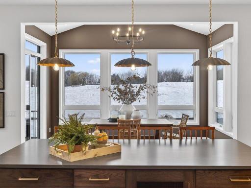 Generous counter space paired with custom cabinetry for optimal functionality