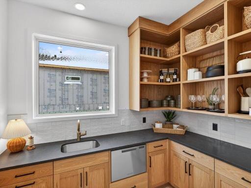 Chefs kitchen window and and cabinetry space