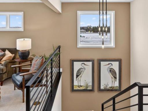 Lighting and Stairway leading up to upper level