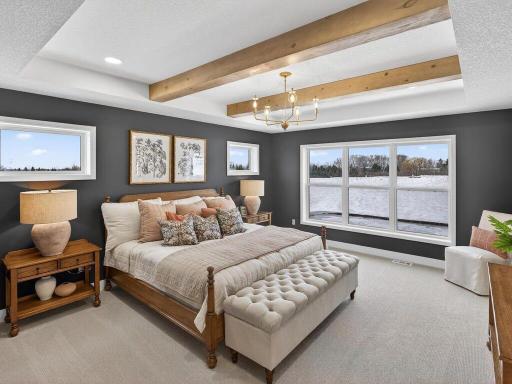 Expansive primary suite offering a peaceful and private retreat
