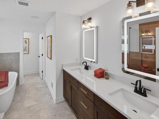 Jack-and-Jill bathroom thoughtfully designed for shared functionality.