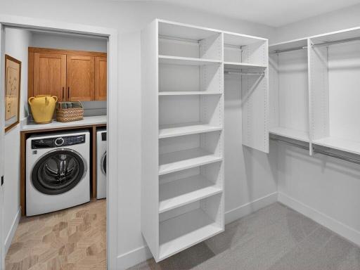 Spacious walk-in closet designed for optimal organization.