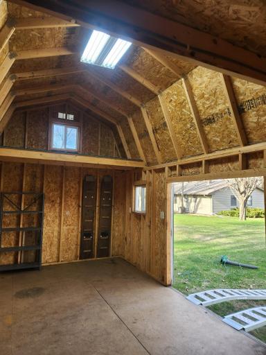 The Shed provides that Extra Space for Outdoor Patio Furniture, Lawn Mowers and all the things we tend to collect as homeowners