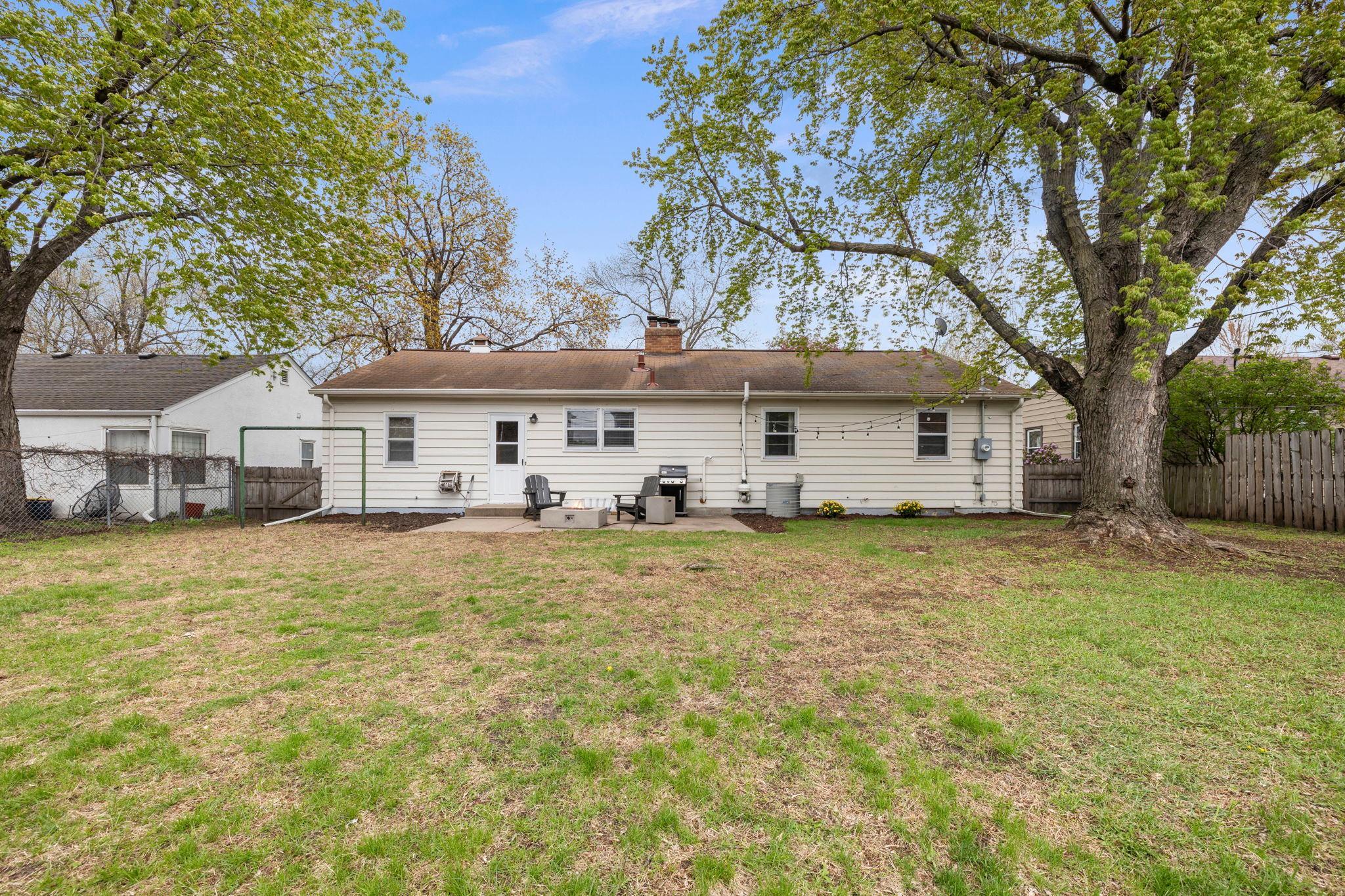 Fully fenced in yard with plenty of flat yard space.