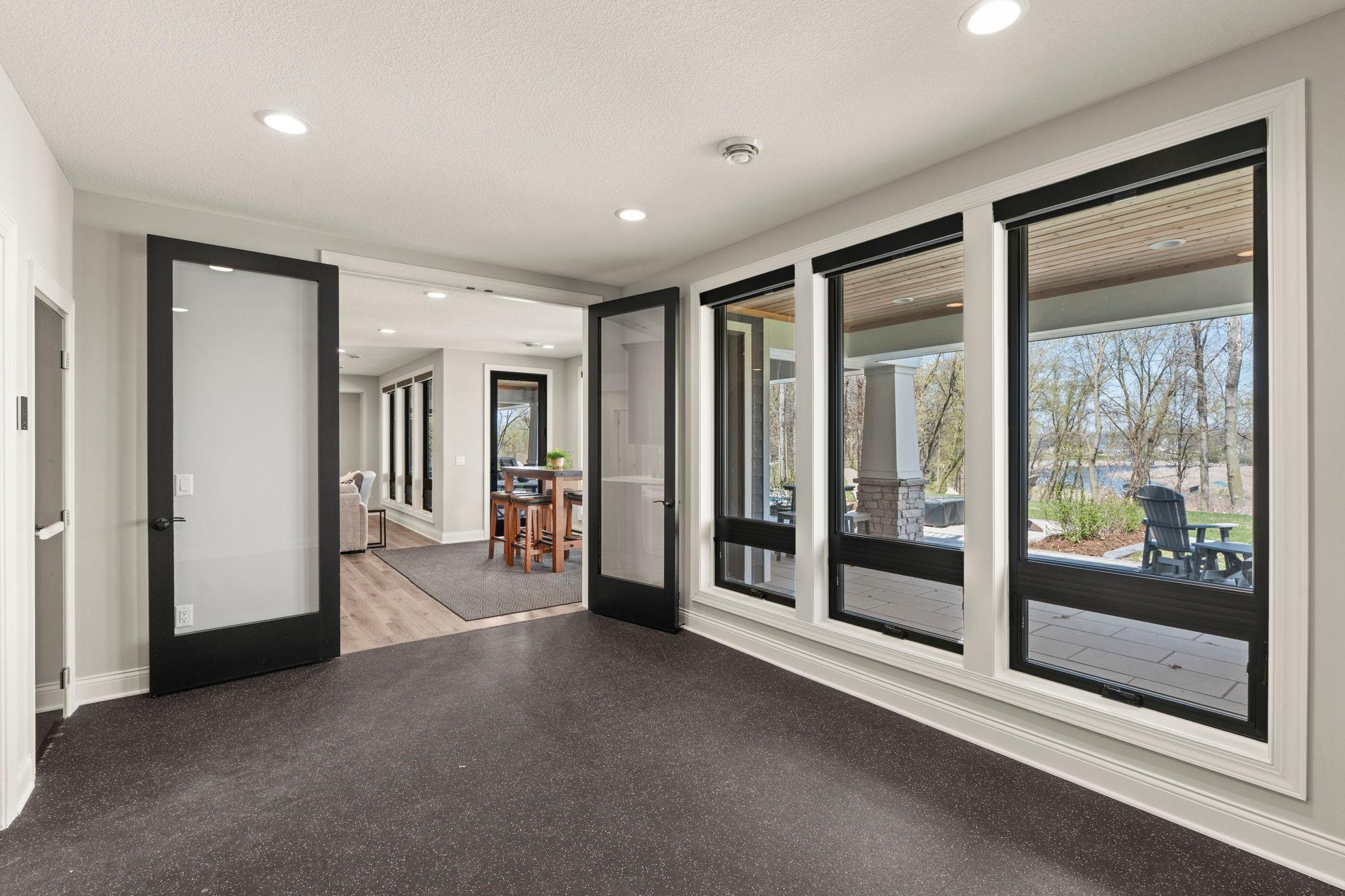 Exercise room with sauna and extra washer & dryer for convenience