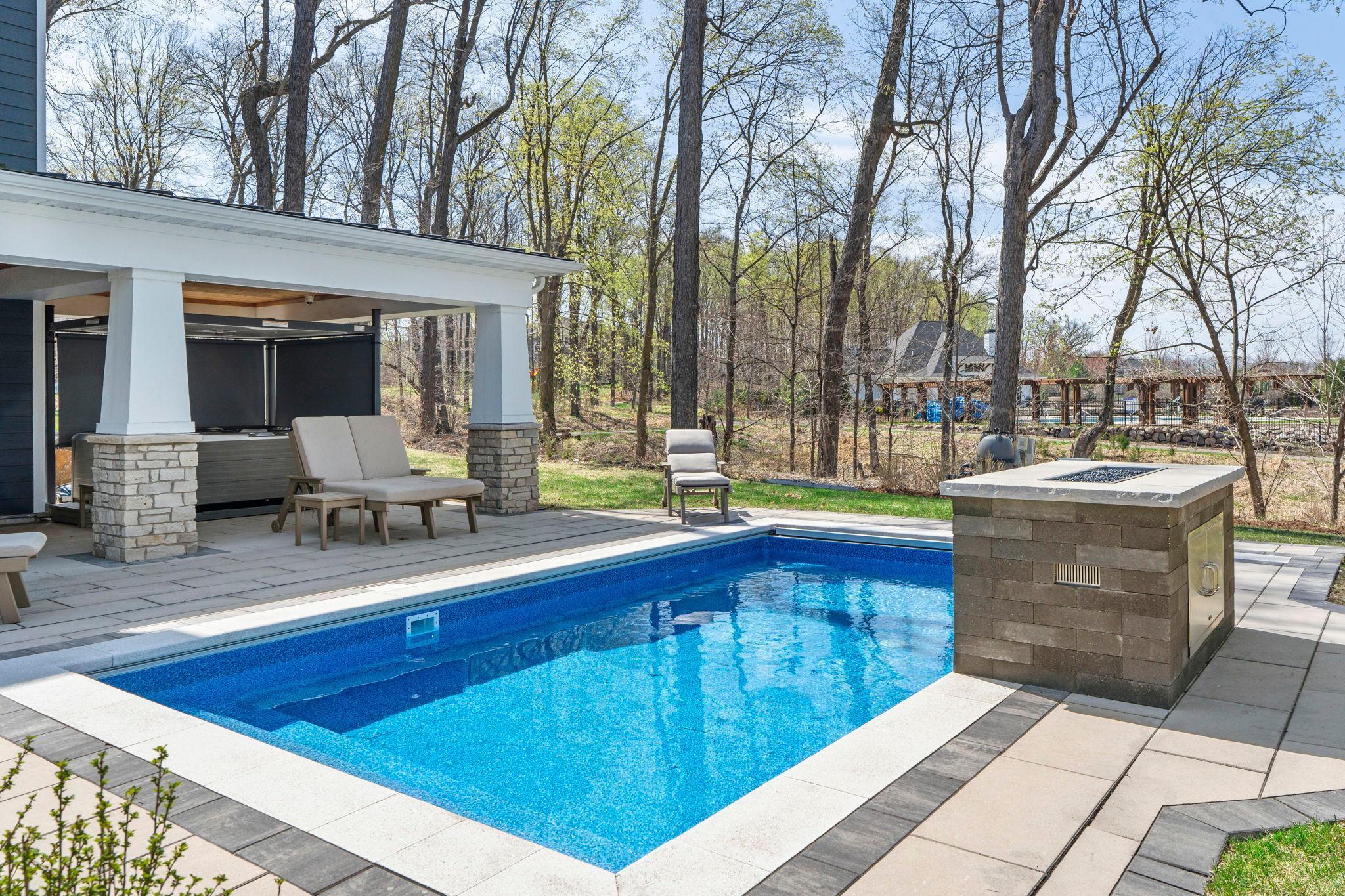 Salt water pool with fireplace and waterfall feature!