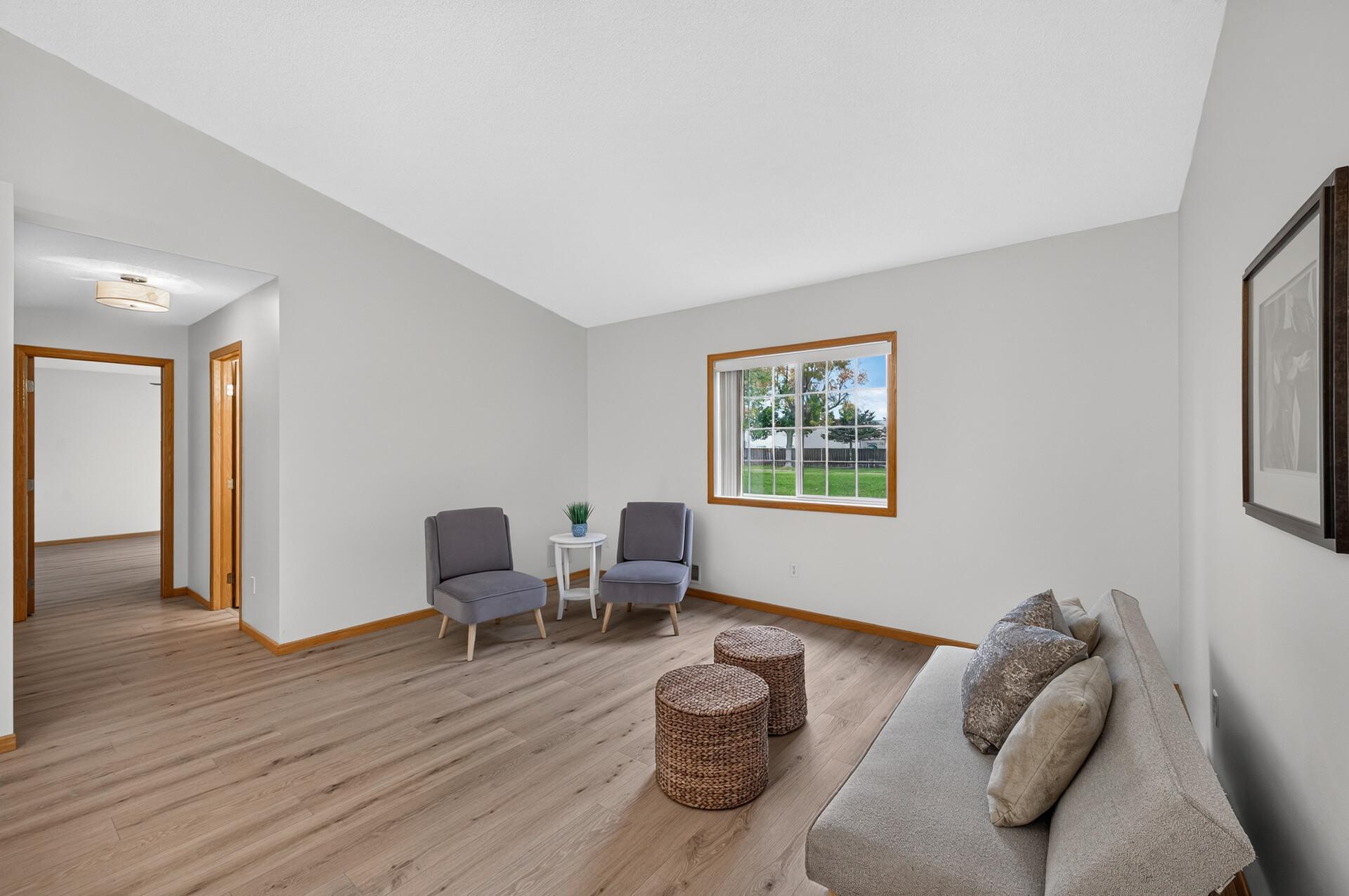 Living room, hallway to primary bedroom