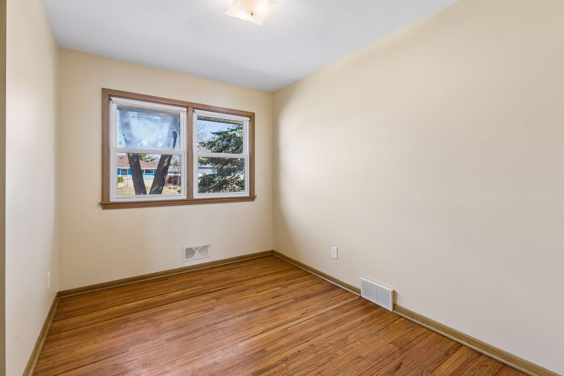 The bedrooms all have generous closets, hardwood floors, and newer windows.
