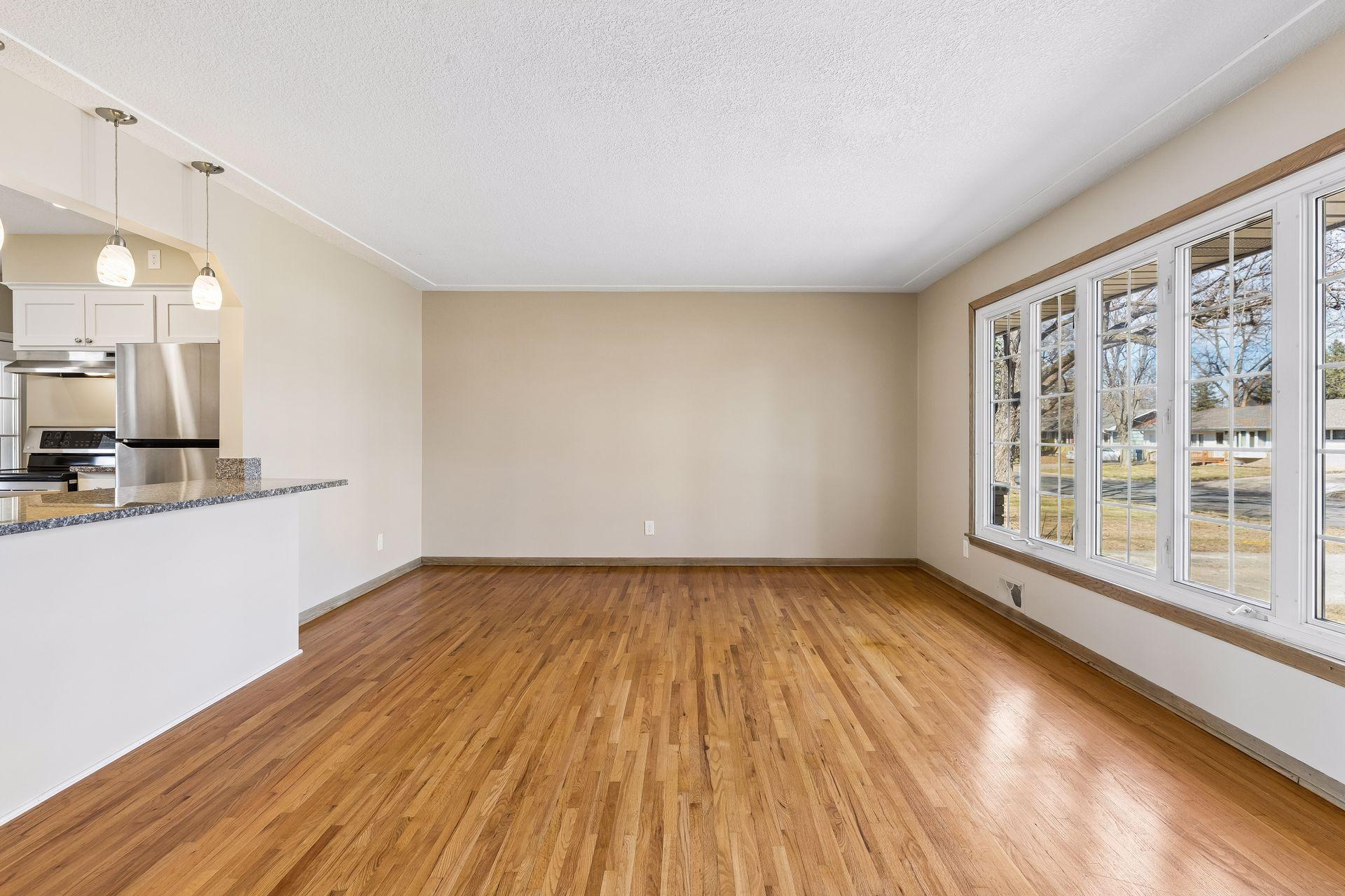 The living room is a great size and has a handy front coat closet.