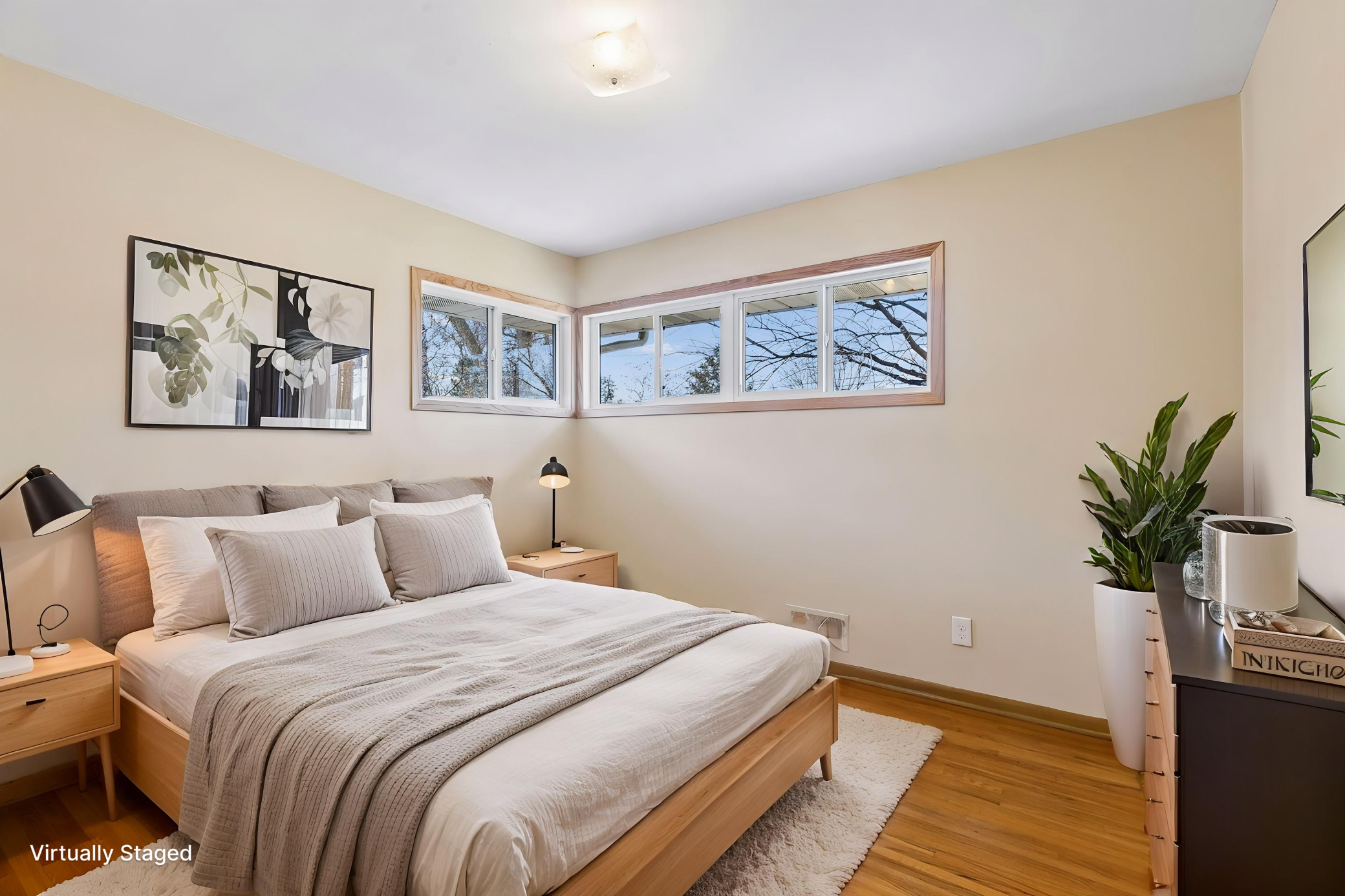 Virtually staged bedroom two.