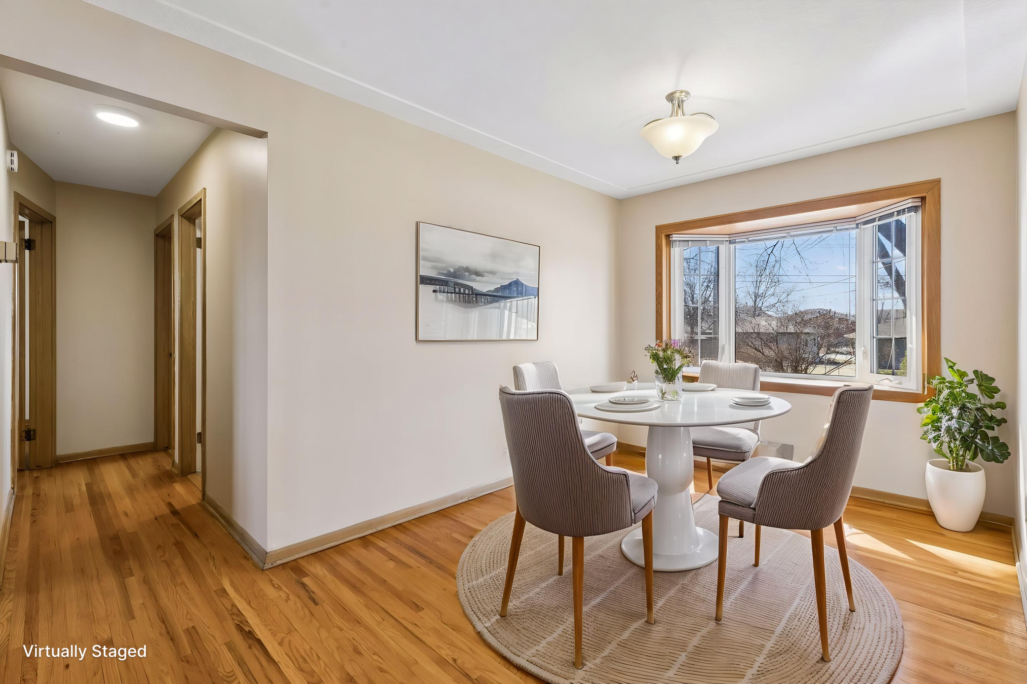 Virtually staged dining room.
