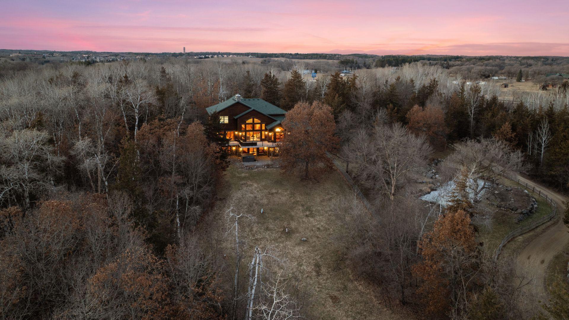 Private, wooded setting with a spacious backyard and scenic natural surroundings