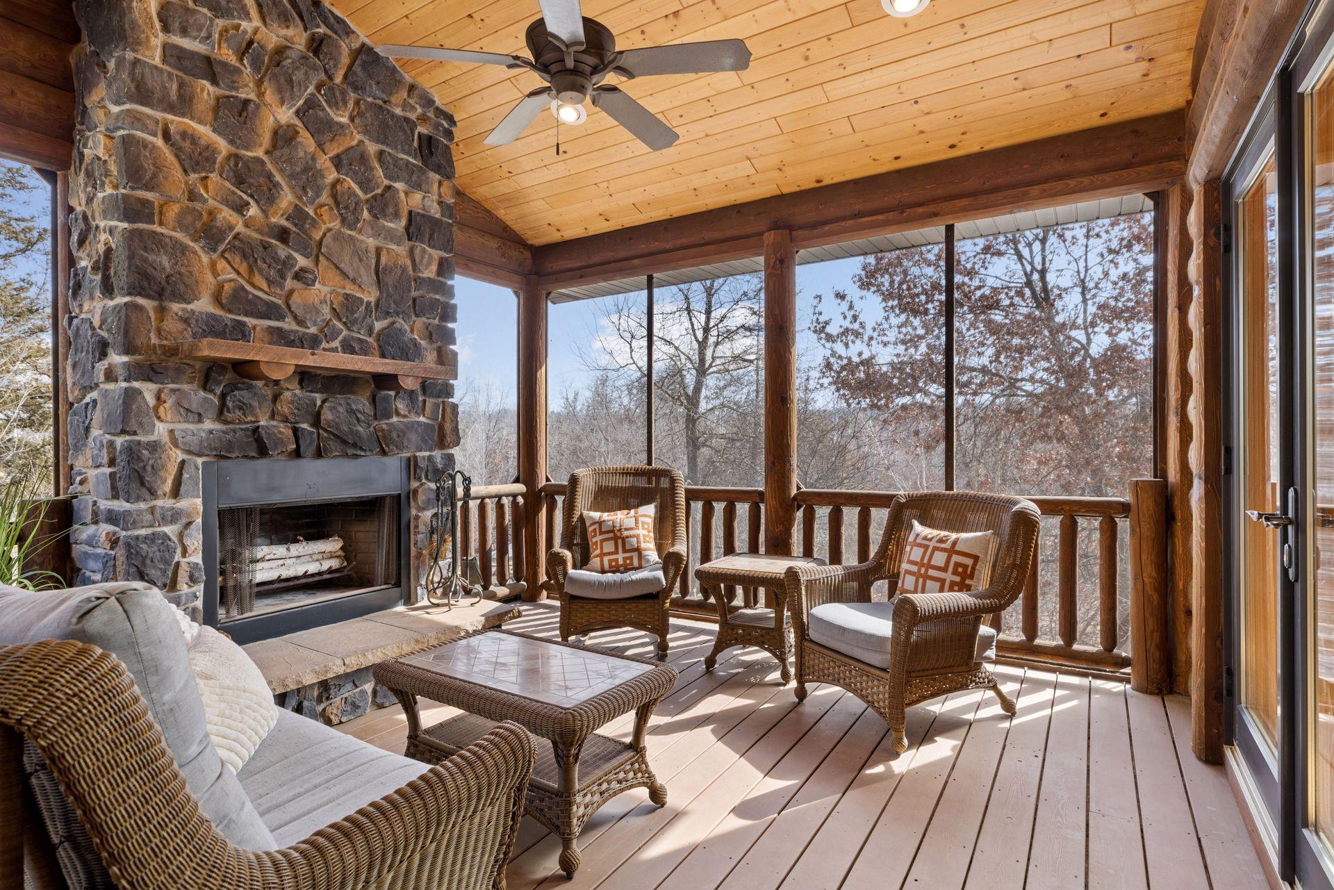 Peaceful screened porch offering wooded views and comfortable outdoor living space