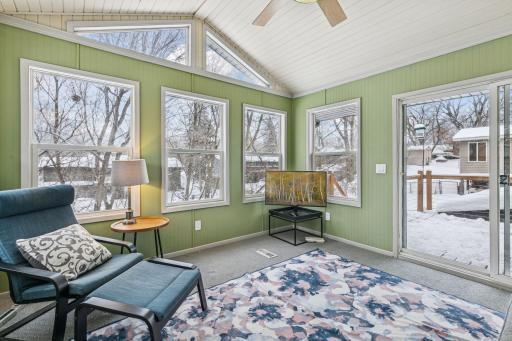 The home features a peaceful 4 season porch. Perfect for a private office space.