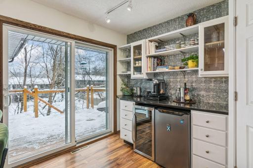 Sellers installed this fantastic bar just off the kitchen and deck. Perfect for entertaining.