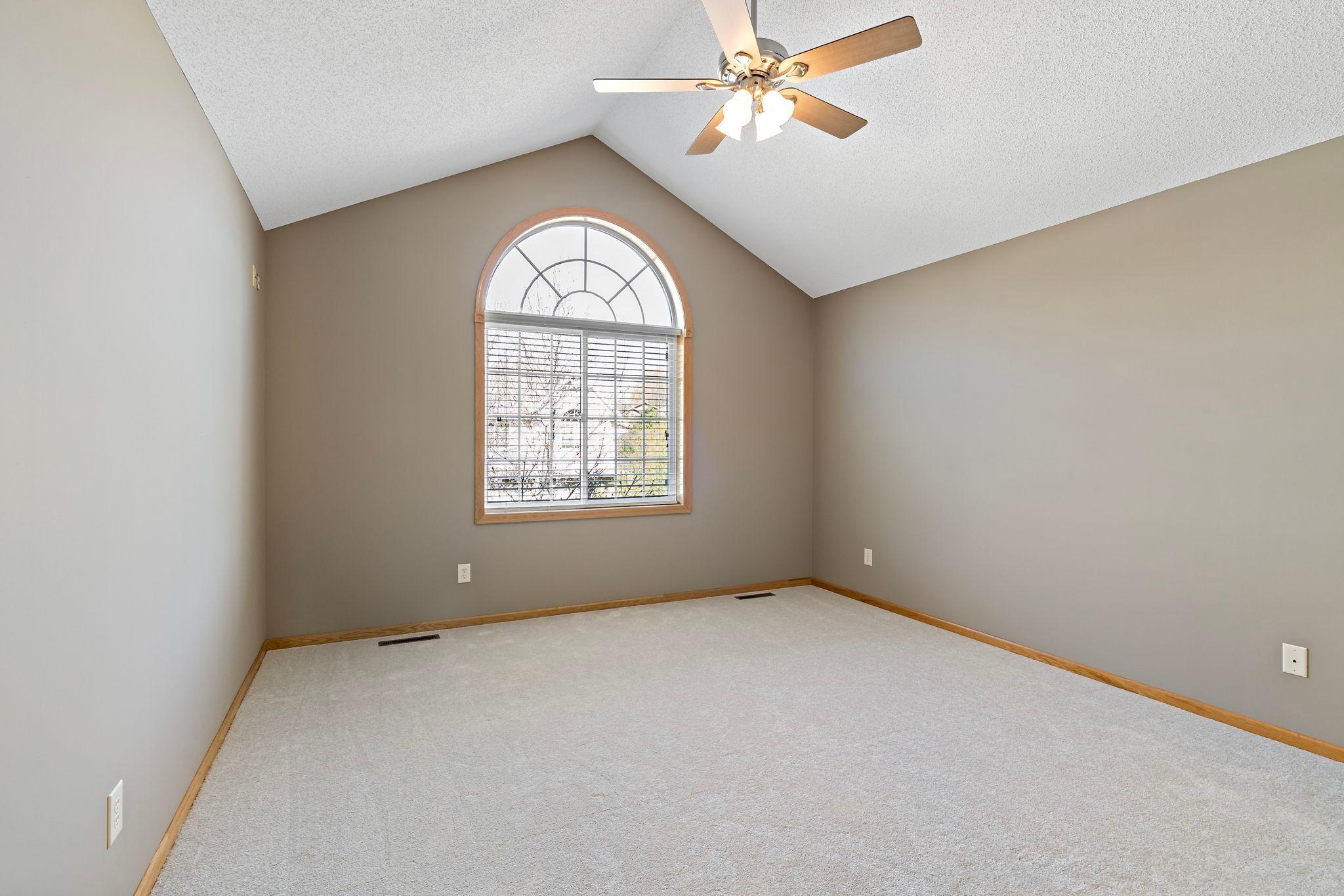 Spacious owners suite with vaulted ceilings