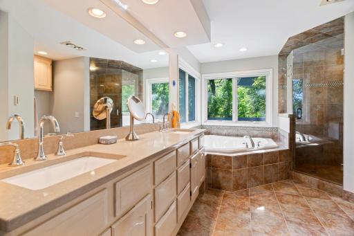 Primary full bathroom ensuite includes heated floors