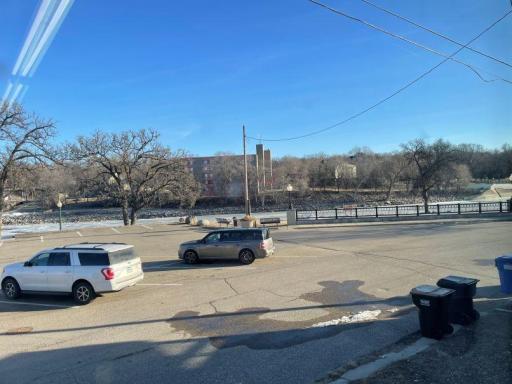 Back city parking lot & view of the river