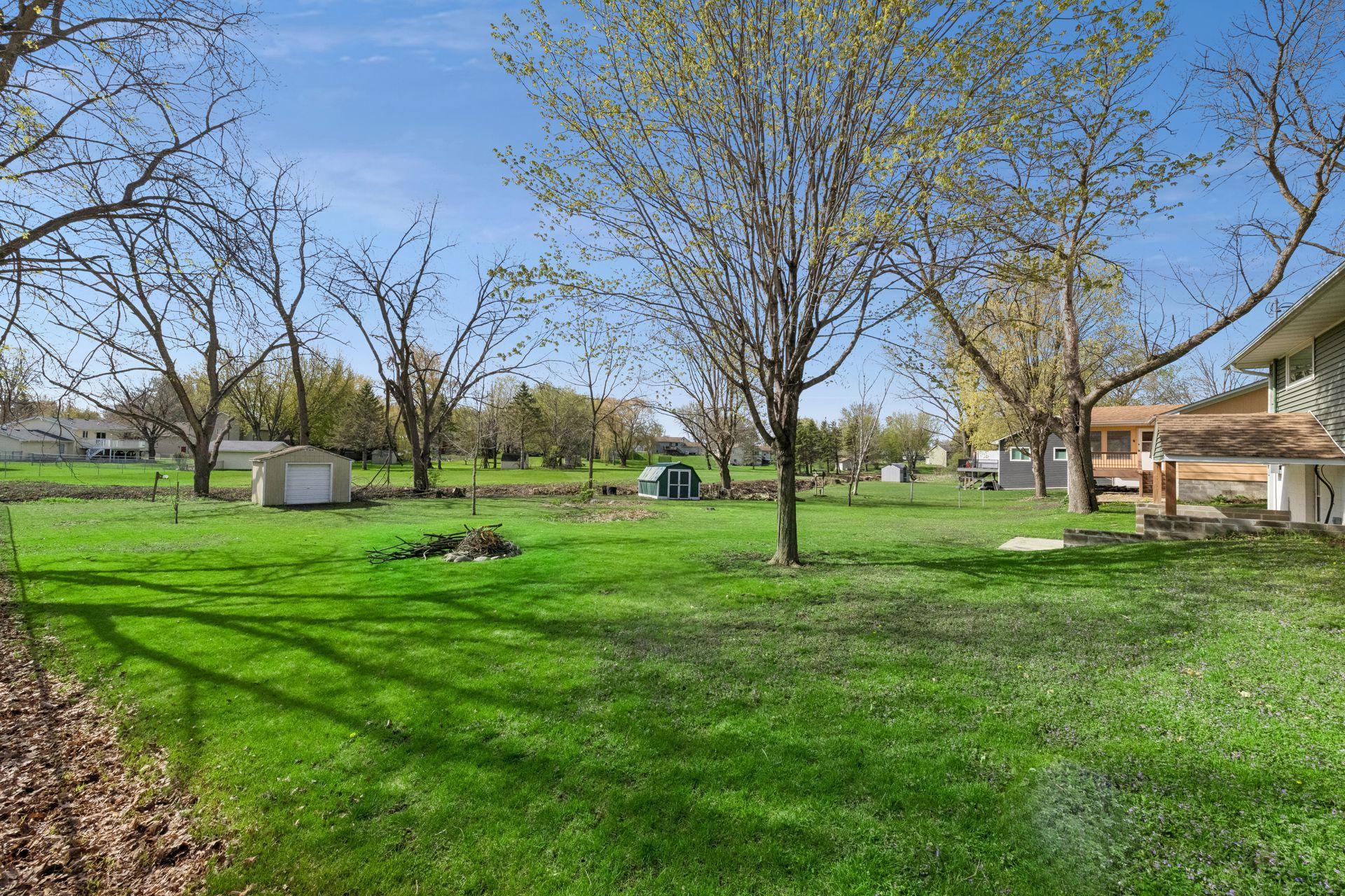 Flat, usable, framed by mature trees, and ready for a garden, a swing set, a workshop, or the future addition you have been priced out of building anywhere else.