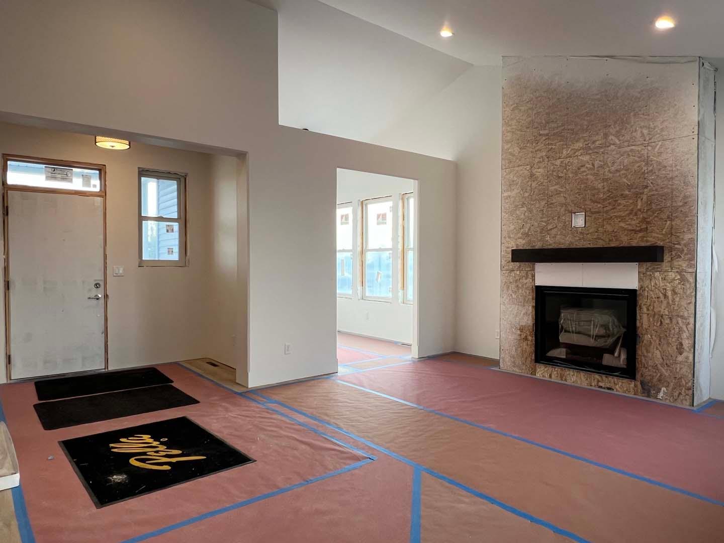 Front entry, great room w/view of 4 season room