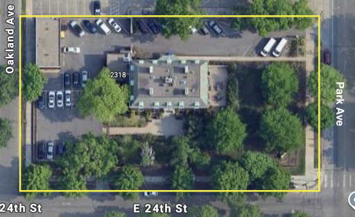 Overhead Aerial of Property showing green space and 29 surface parking spots along with a 4+ car heated garage.