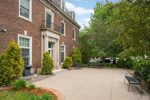 Enjoy a large patio leading off the current break room.
