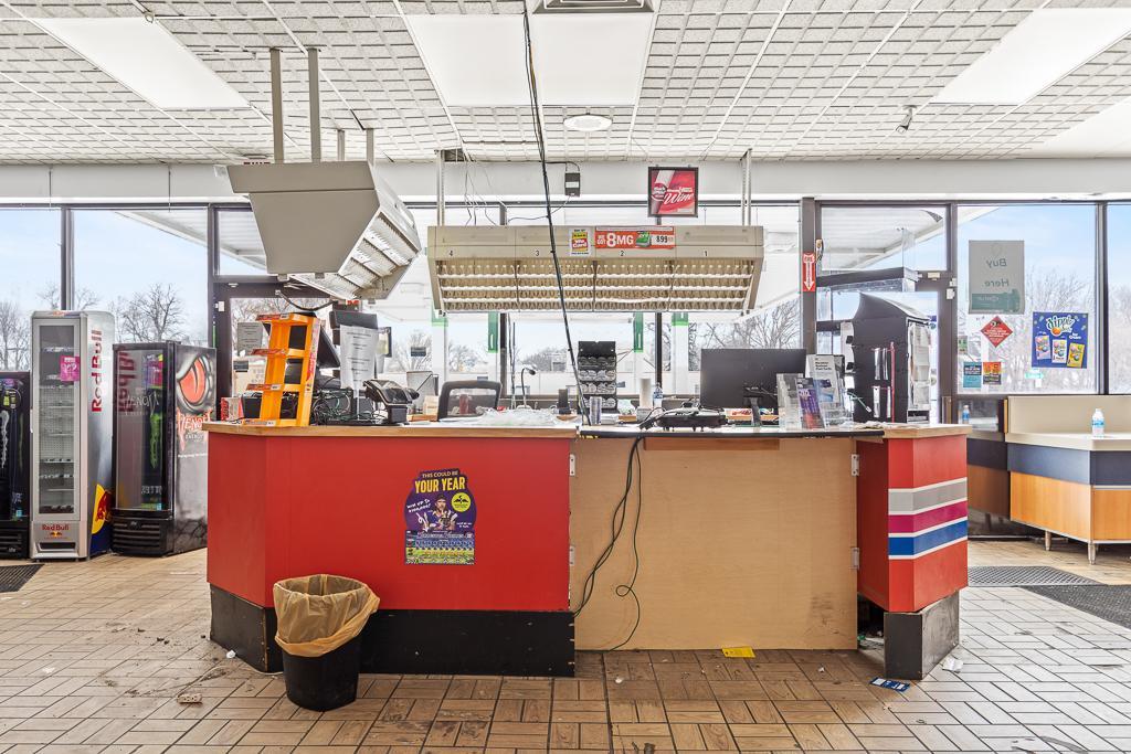 Front entry doors on either side of the service counter for easy payments if reopening as a gas station.