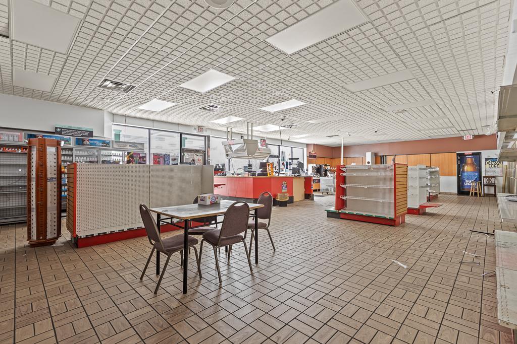 Spacious interior with great layout—next step: tidy up and stock the shelves.