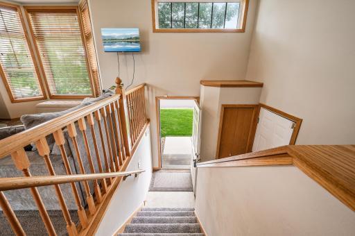 Entryway is bright and has high ceilings along with a coat closet for your guest.