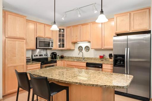 Spacious kitchen with granite counter/center island