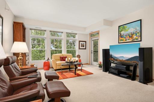Patio door from living room leads to private screened deck