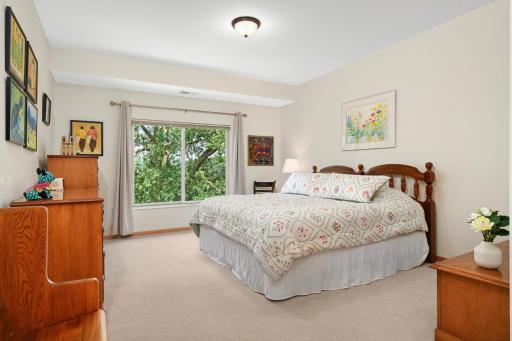 Spacious owner's suite with walk-in closet and private full bathroom