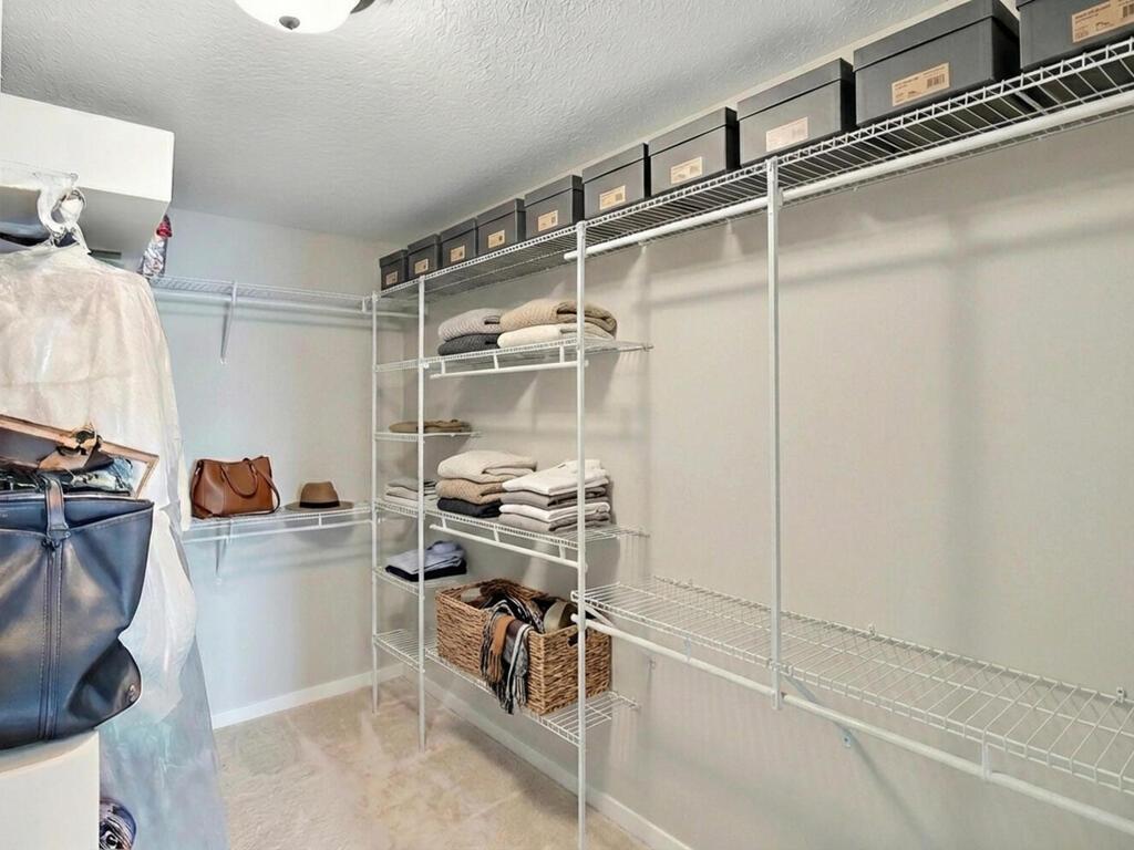 Walk-in closet primary bedroom