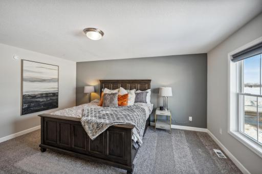 Sun filled Primary Suite *Photo of actual home
