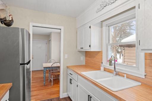 Plenty of cabinetry, updated faucet, & more.