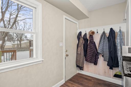 Back entrance from deck. Includes coat hanger area, too.