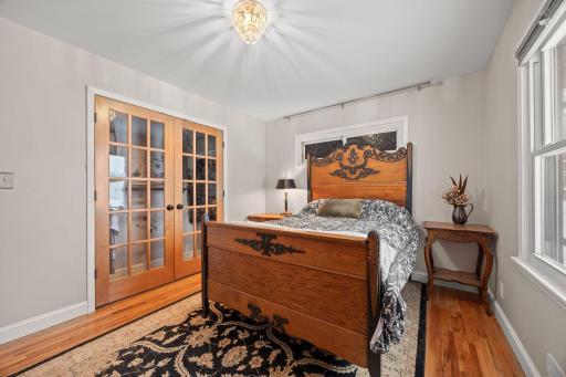 Large closet with french doors for better access & storage.