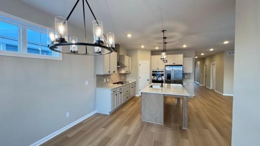 Actual Home Dining and Kitchen, Stainless Steel Appliances, Quartz Countertops, Gas Cooktop, Microwave Oven, WOW!!